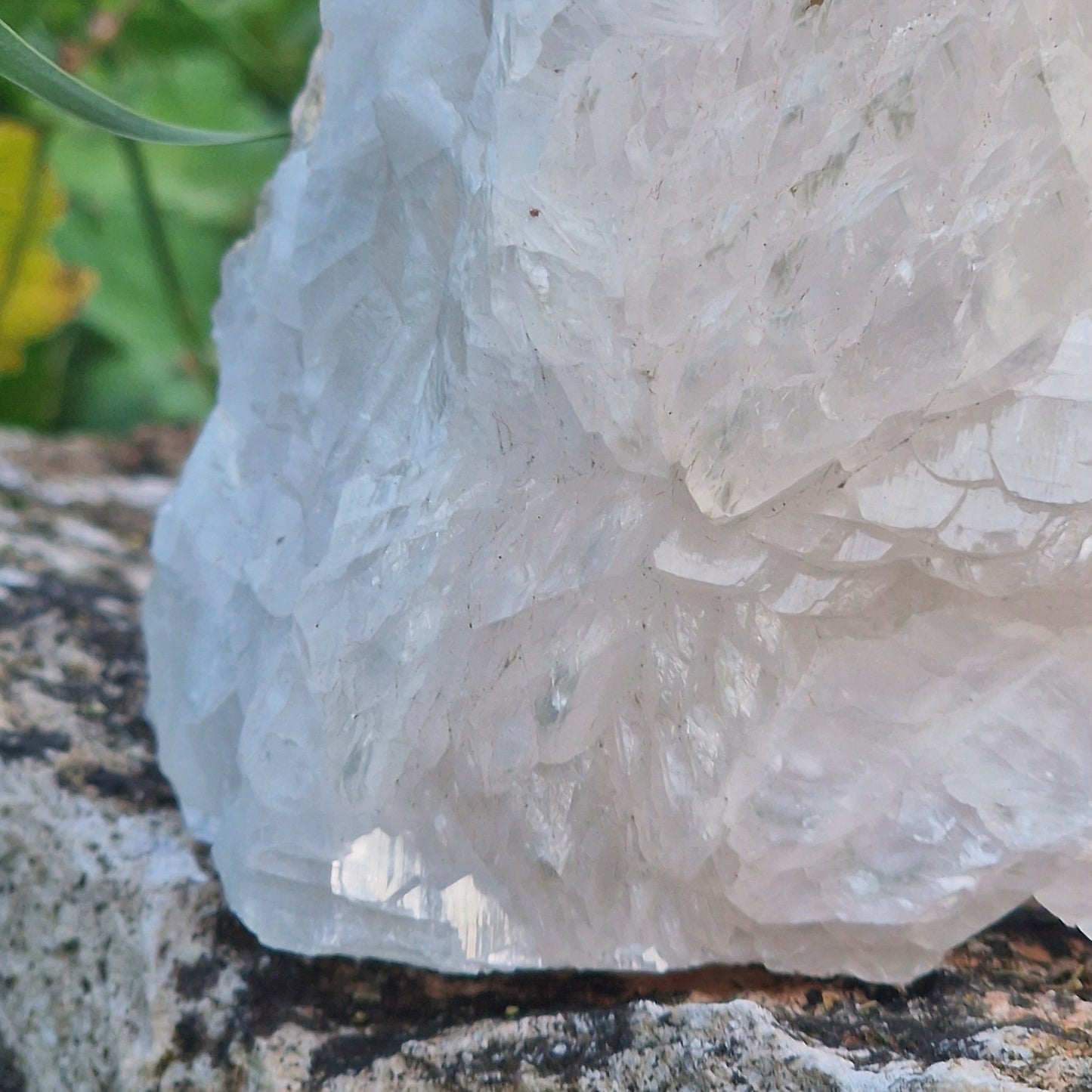 Handcrafted Tree of Life sculpture made with mother of pearl, quartz, and clear crystal on a white quartz base – 26 cm tall.